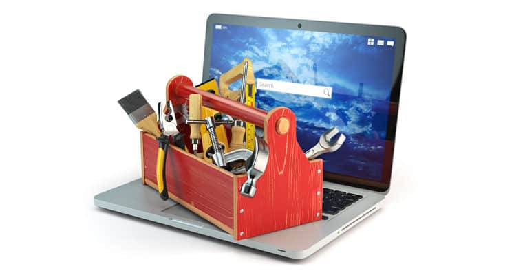 laptop and toolbox with tool